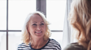 Photo of two friends talking