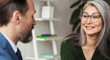 photo of two members having a conversation